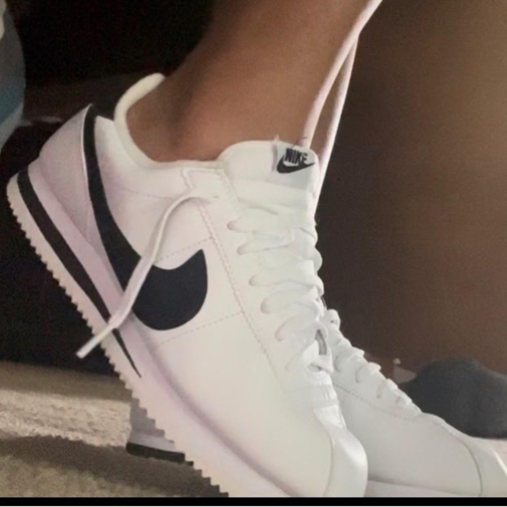 Black and White Nike Cortez.
